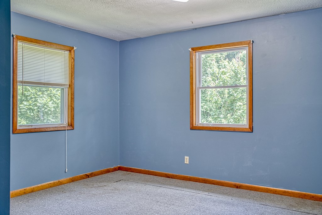 541 Bennett Road Sparta, TN 38583 - Photo 18 of 27 a view of an empty room with a window