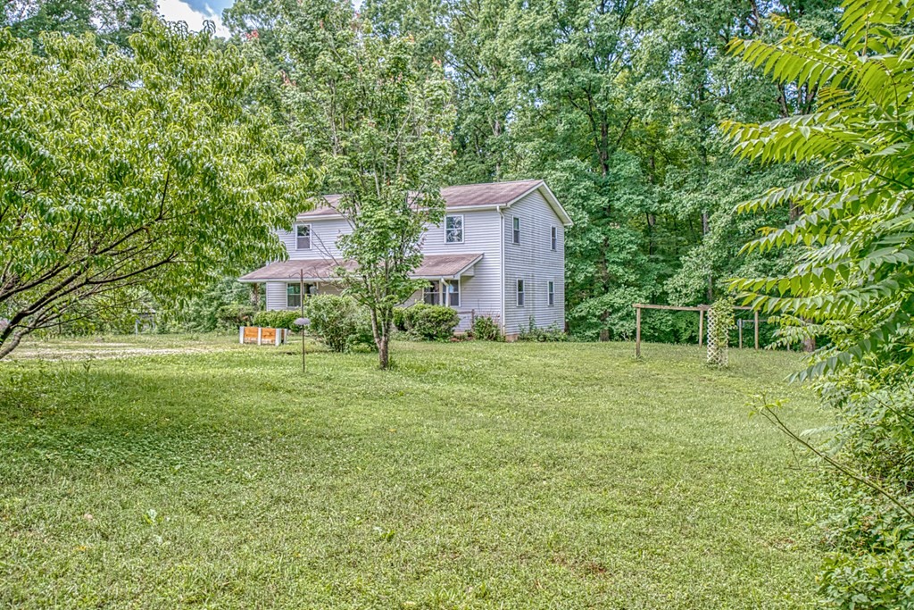 541 Bennett Road Sparta, TN 38583 - Photo 27 of 27 a view of a big yard next to a house