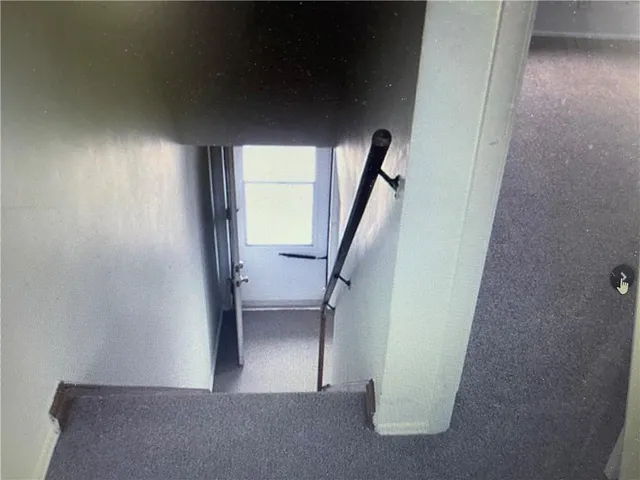a bathroom with a granite countertop sink a toilet and bathtub