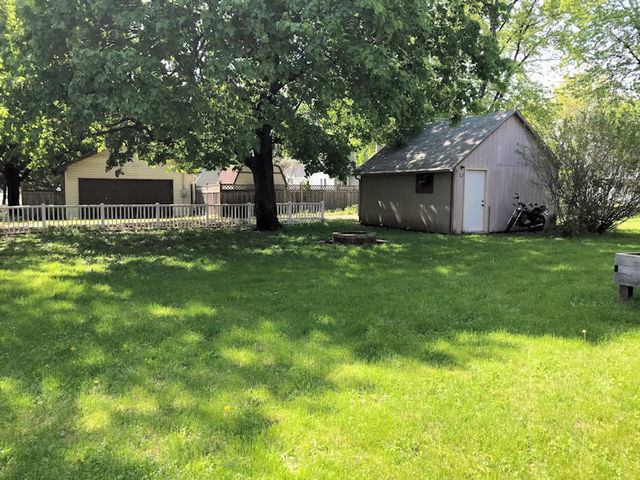 330 Woolf Court Rochelle, IL 61068 - Photo 14 of 15 a house view with a garden