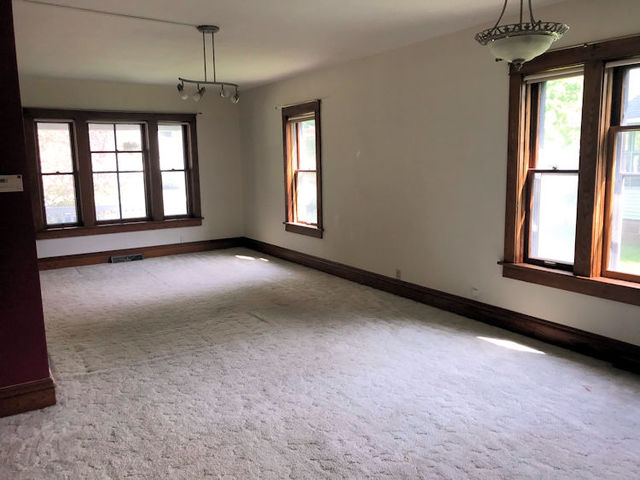 330 Woolf Court Rochelle, IL 61068 - Photo 5 of 15 a view of an empty room with a window