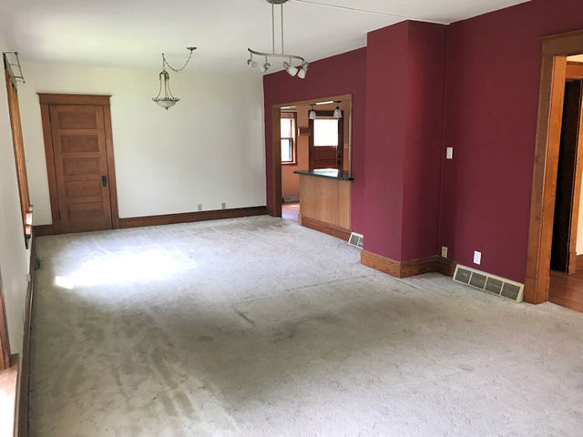 330 Woolf Court Rochelle, IL 61068 - Photo 6 of 15 a view of a livingroom with a fireplace