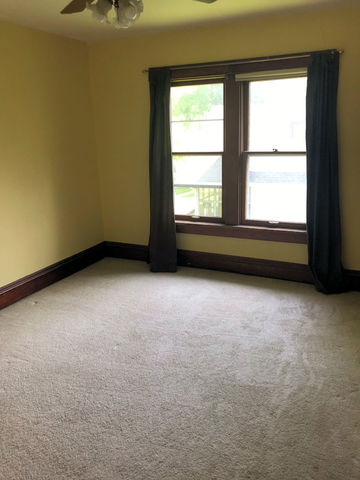 330 Woolf Court Rochelle, IL 61068 - Photo 8 of 15 an empty room with a window