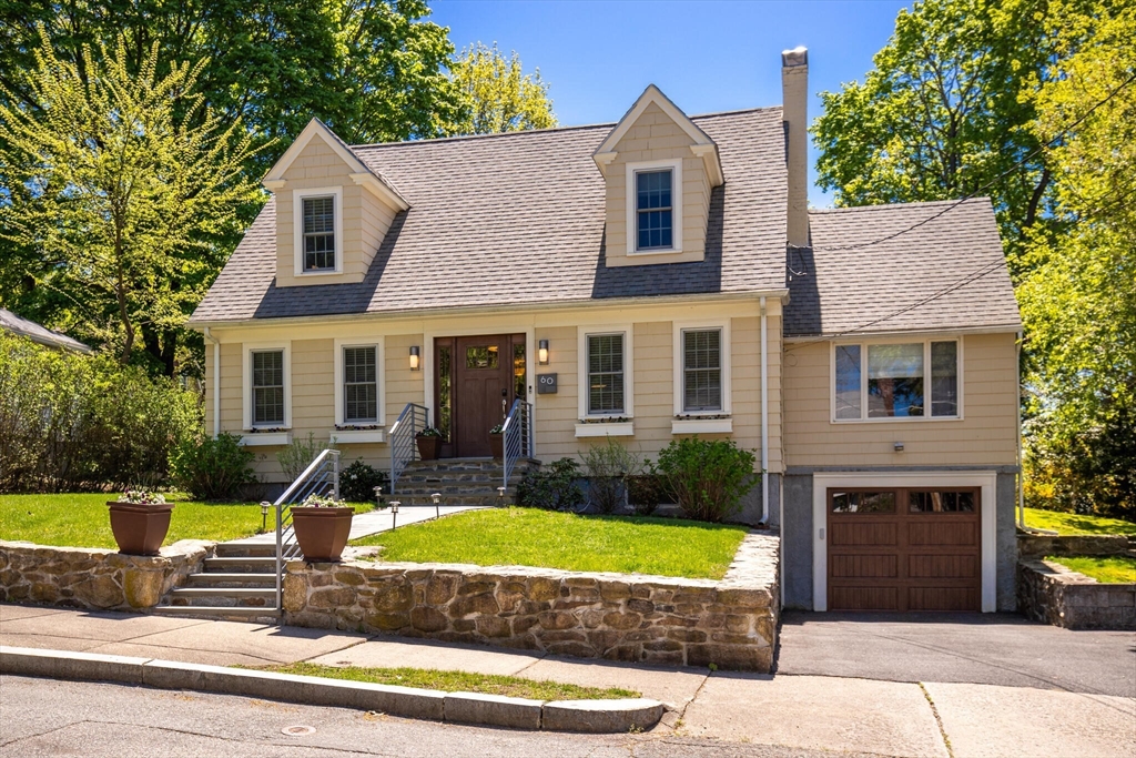 60 Amherst Road Newton, MA 02468 - Photo 1 of 25 a view of a house with swimming pool and a yard