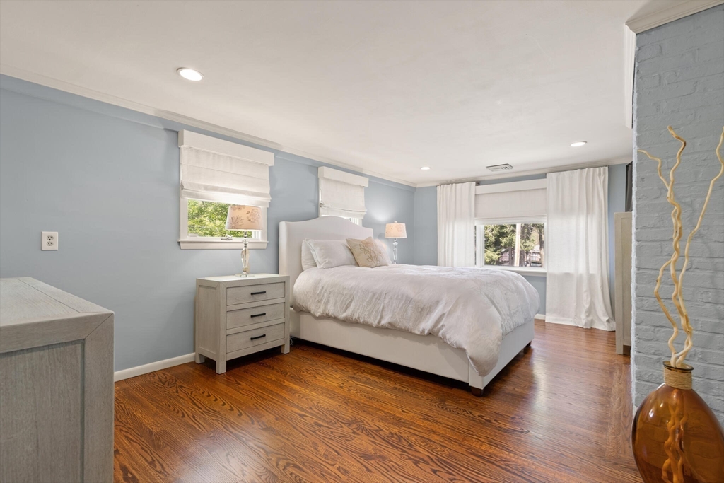 60 Amherst Road Newton, MA 02468 - Photo 12 of 25 a bedroom with a bed and a window