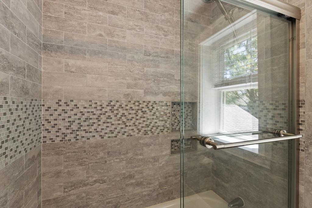 60 Amherst Road Newton, MA 02468 - Photo 21 of 25 a bathroom with a shower