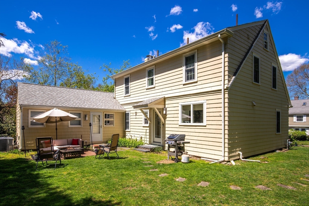 60 Amherst Road Newton, MA 02468 - Photo 25 of 25 a view of a house with a yard and sitting area