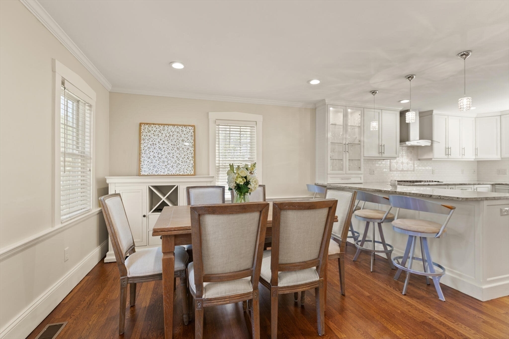 60 Amherst Road Newton, MA 02468 - Photo 7 of 25 a view of a dining room with furniture and wooden floor