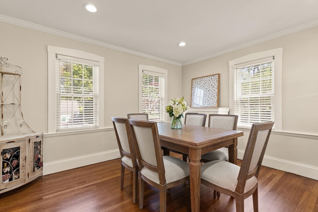 60 Amherst Road Newton, MA 02468 - Photo 8 of 25 a view of a dining room with furniture window and wooden floor