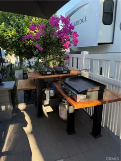 a front view of a house with outdoor seating