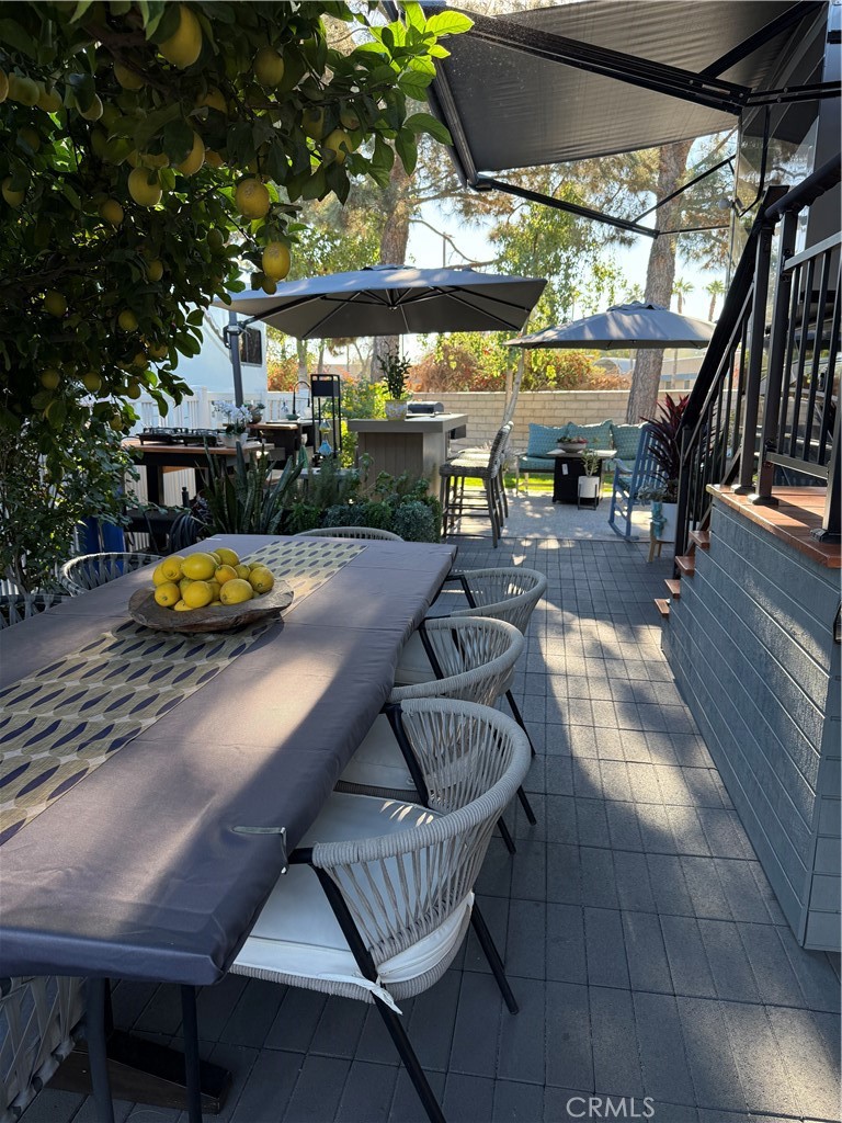 69411 Ramon Road Cathedral City, CA 92234 - Photo 4 of 5 a swimming pool with outdoor seating