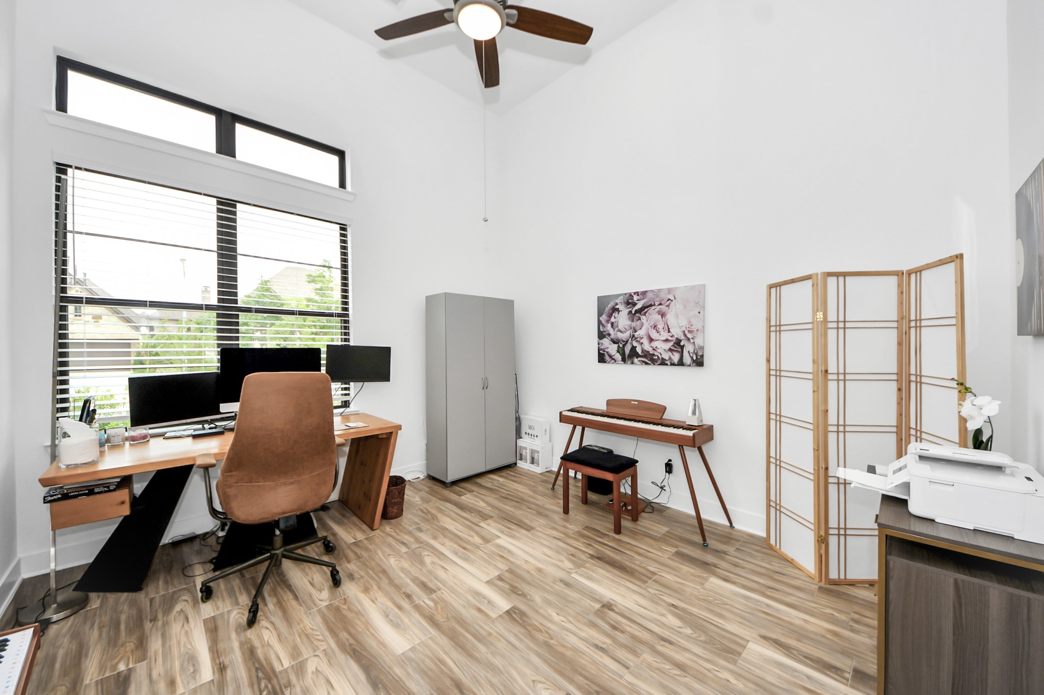 17355 Camillia Trail Conroe, TX 77302 - Photo 12 of 34 a workspace with furniture hardwood and a window