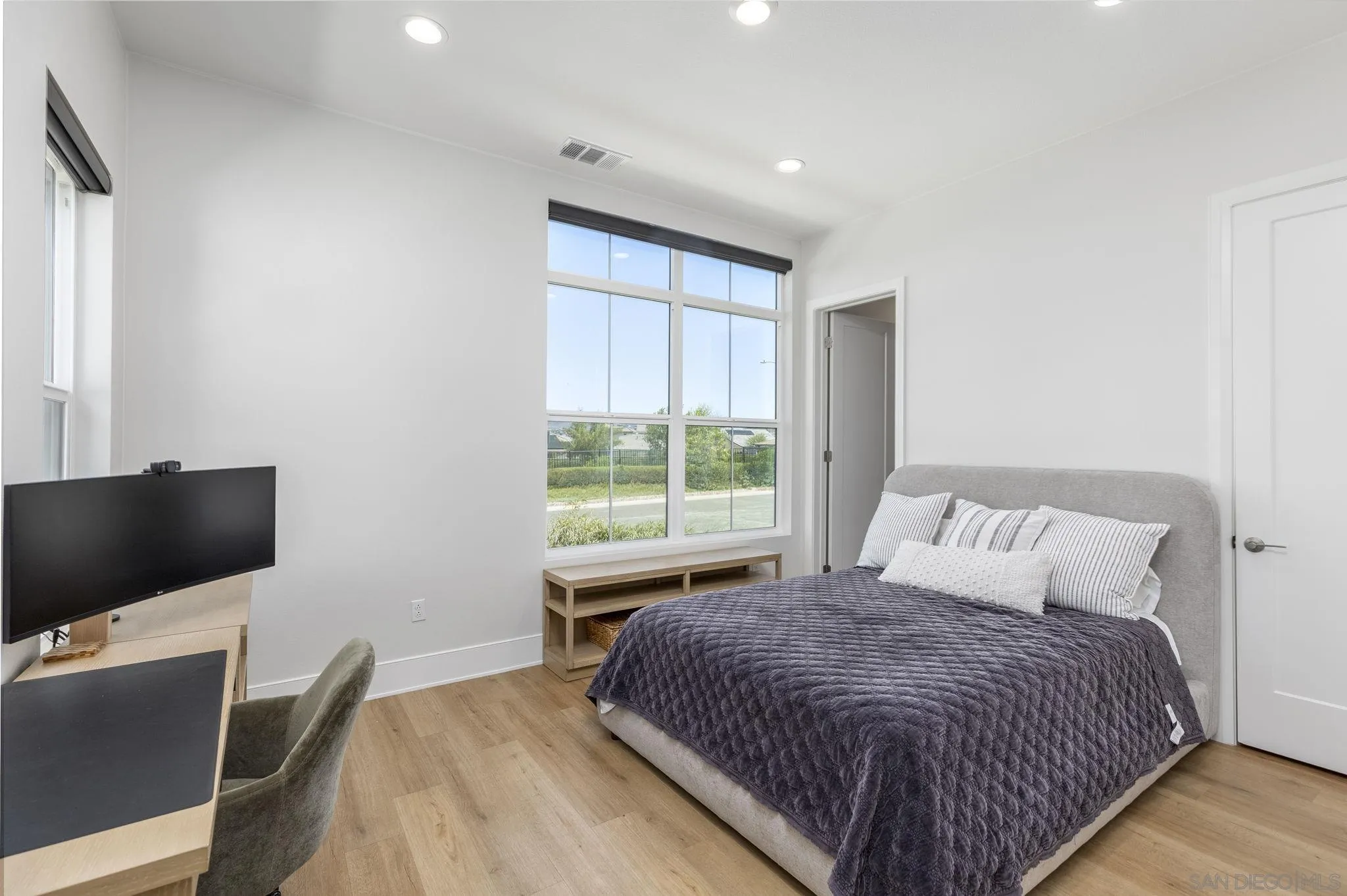32213 Daybrook Terrace Temecula, CA 92591 - Photo 14 of 23 a bedroom with a bed and a flat screen tv