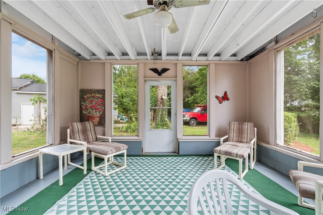1067 Munroe Falls Kent Road Kent, OH 44240 - Photo 26 of 31 Sunroom featuring ceiling fan