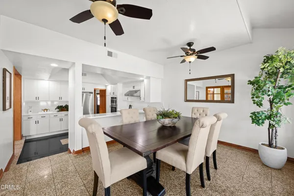 a view of walk in closet with wooden floor