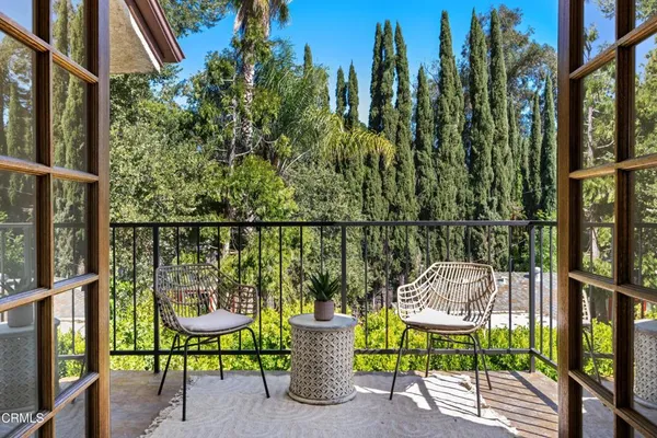 a view of street with large trees