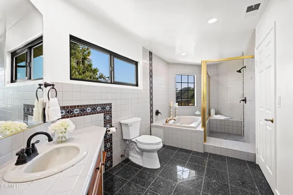 a view of a pathway of a yard