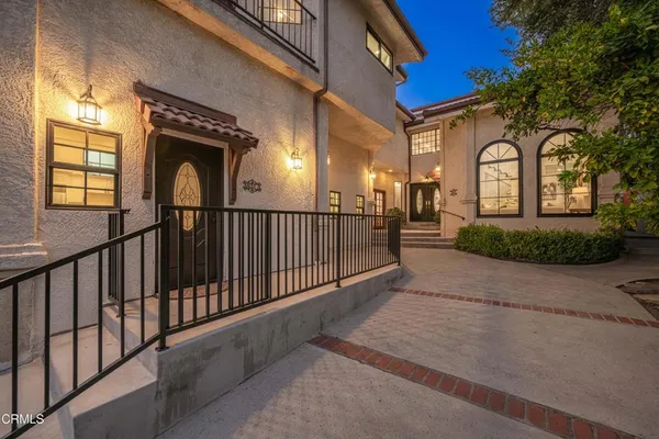 an aerial view of houses with outdoor space