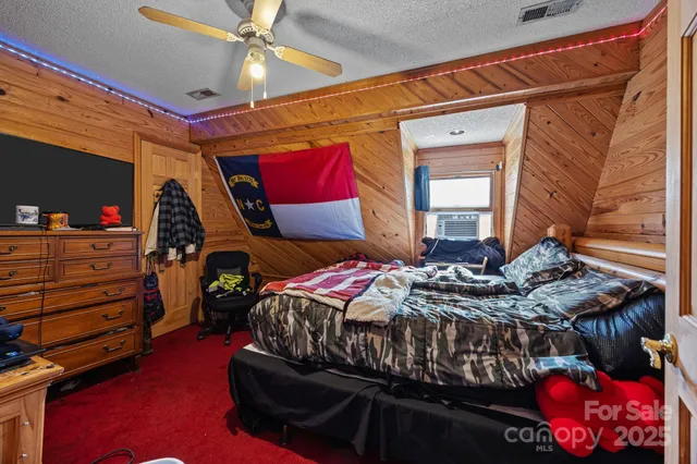 a room filled with furniture and a flat screen tv