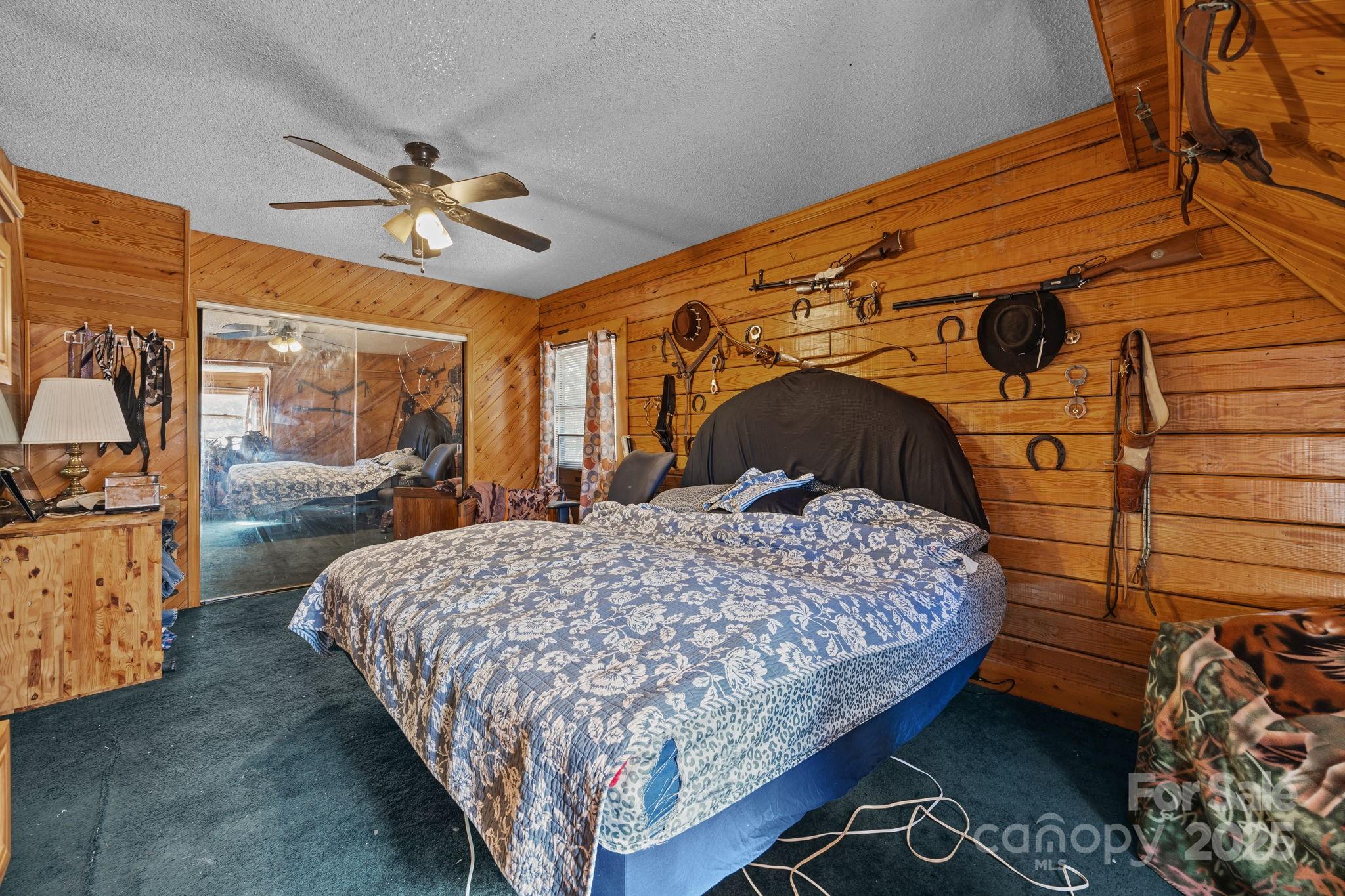 3178 Foxford Road Concord, NC 28025 - Photo 14 of 48 a bedroom with a bed mirror and window