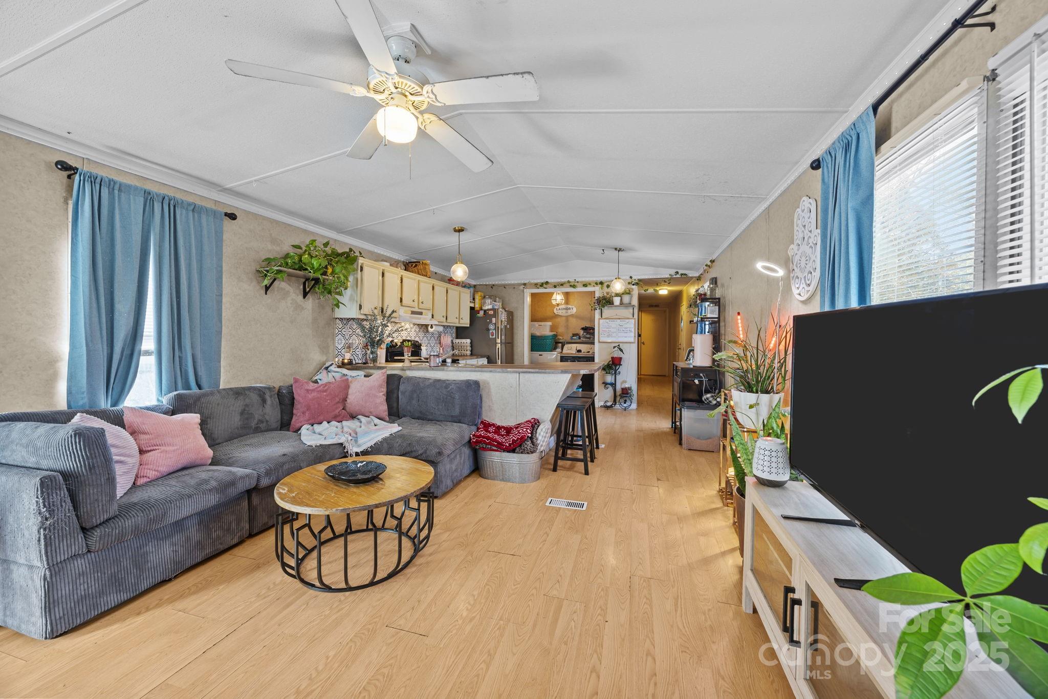 3178 Foxford Road Concord, NC 28025 - Photo 21 of 48 a living room with furniture kitchen view and a window