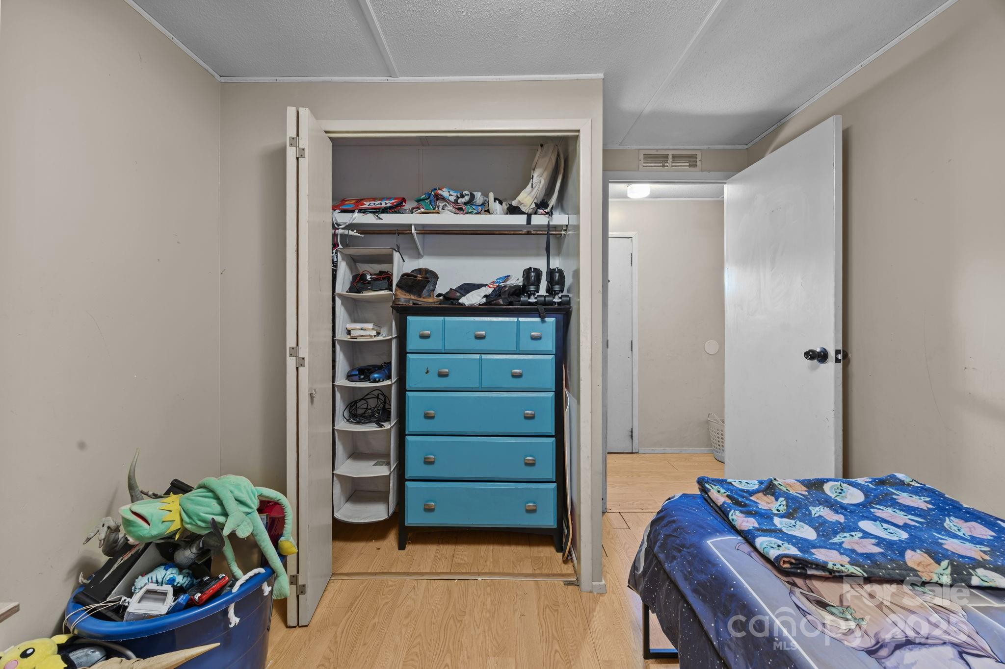3178 Foxford Road Concord, NC 28025 - Photo 23 of 48 a bedroom with a bed and a closet