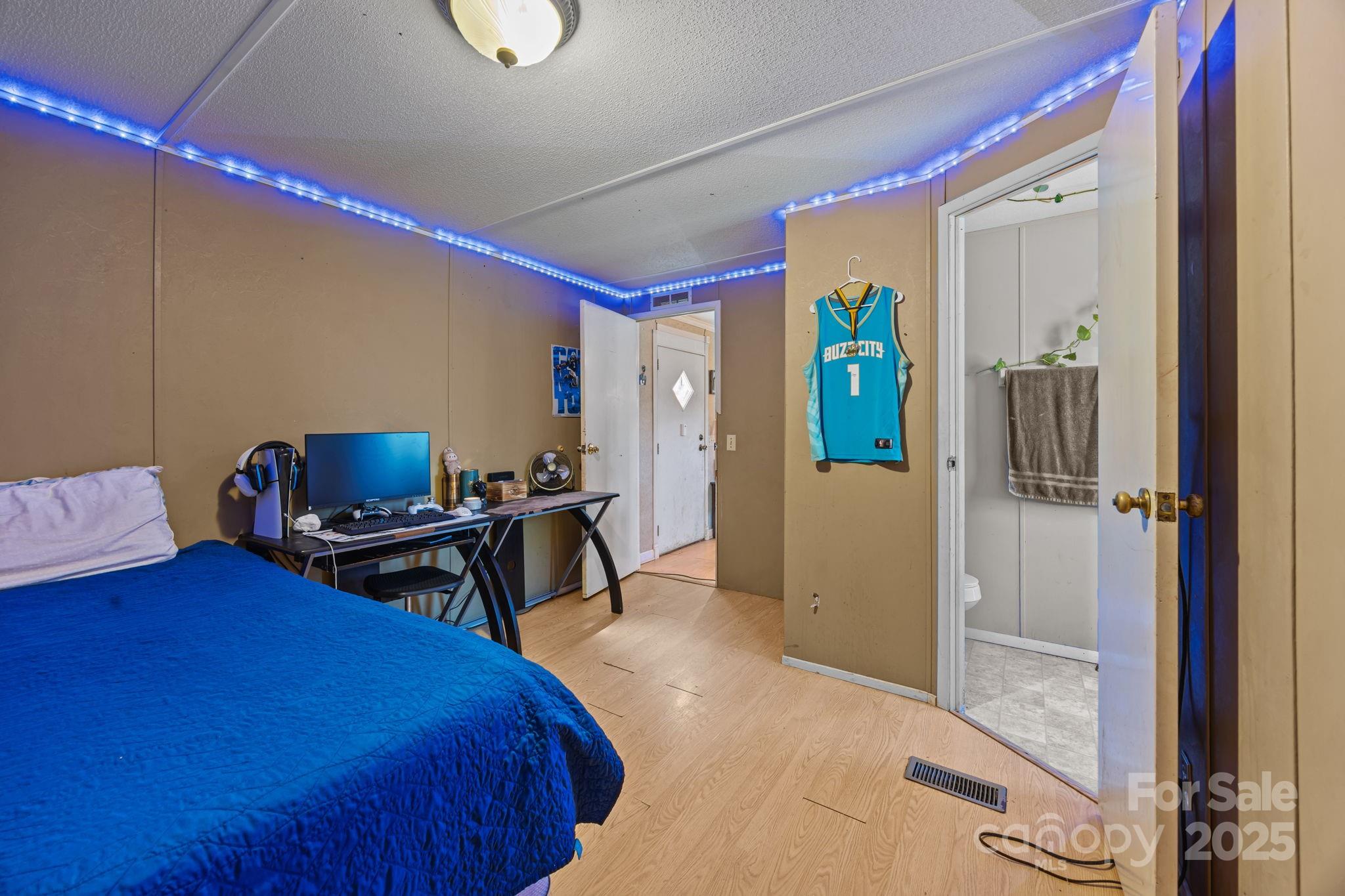 3178 Foxford Road Concord, NC 28025 - Photo 26 of 48 a bedroom with a bed and a table