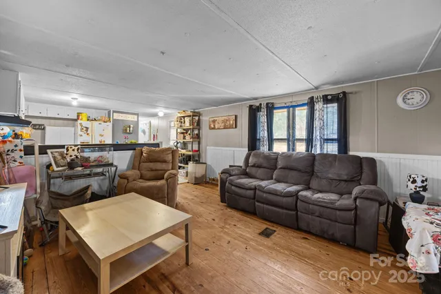 a living room filled with furniture and a couch