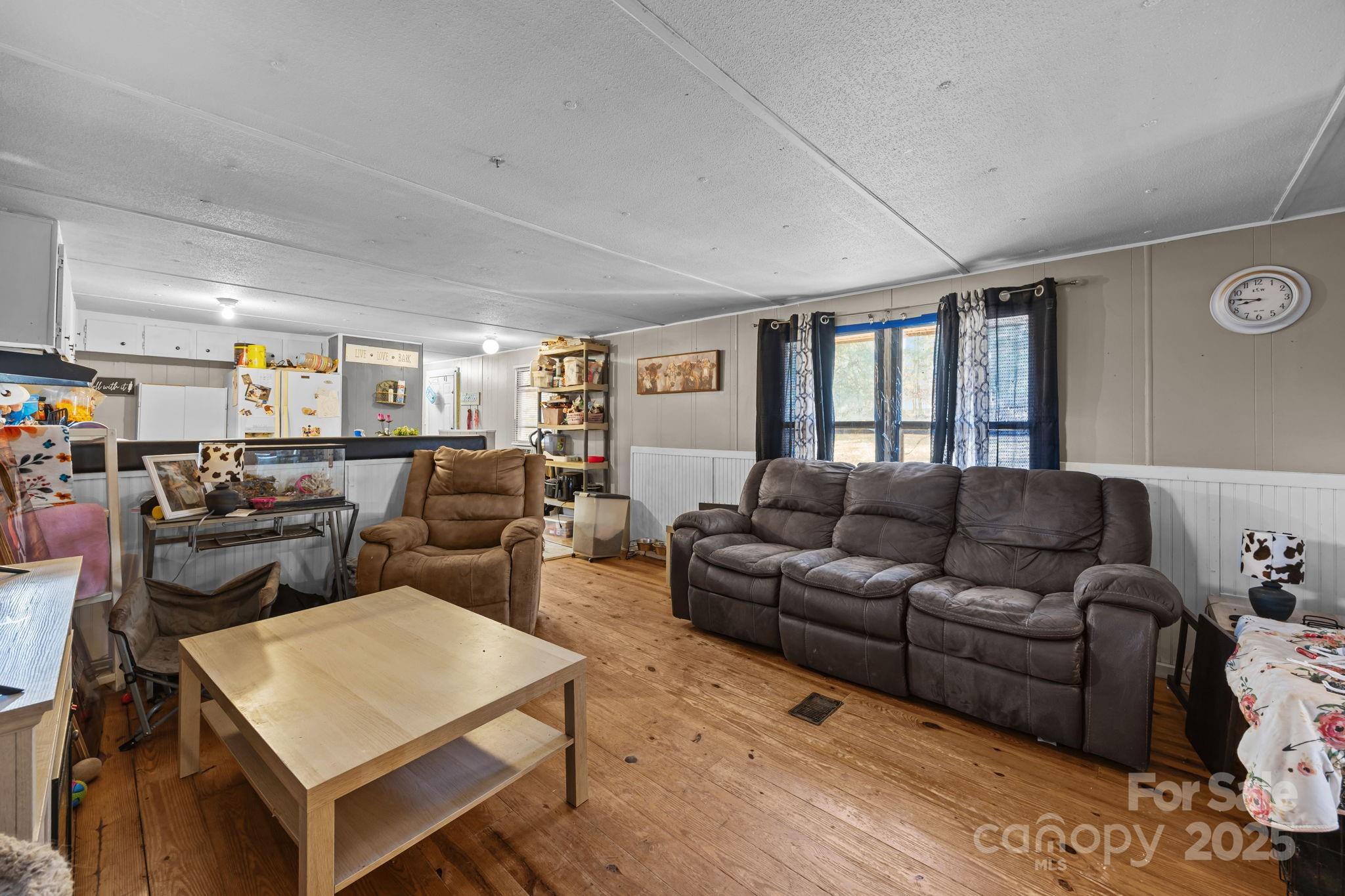 3178 Foxford Road Concord, NC 28025 - Photo 29 of 48 a living room with furniture kitchen view and a window
