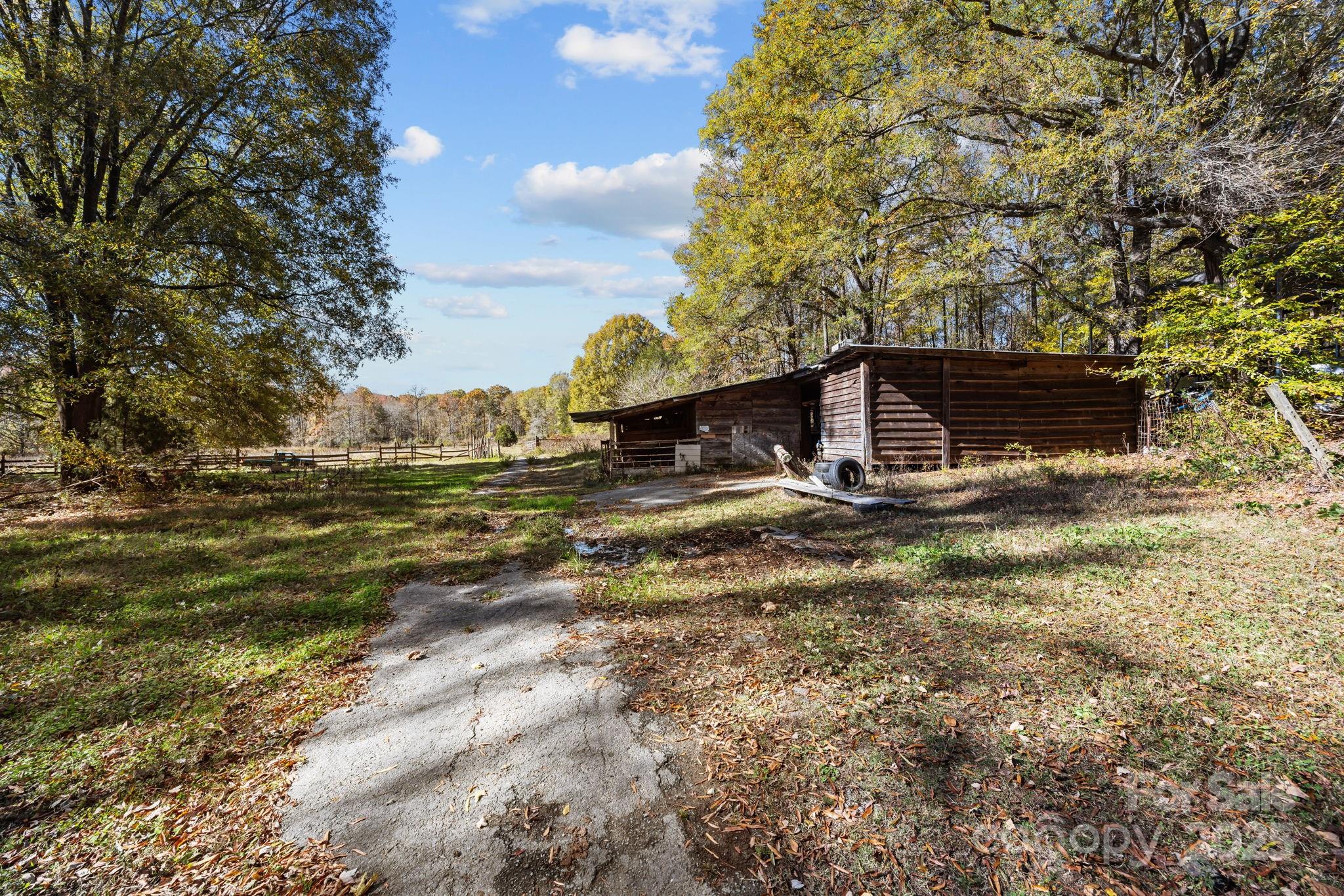 3178 Foxford Road Concord, NC 28025 - Photo 36 of 48 a view of a house with a yard