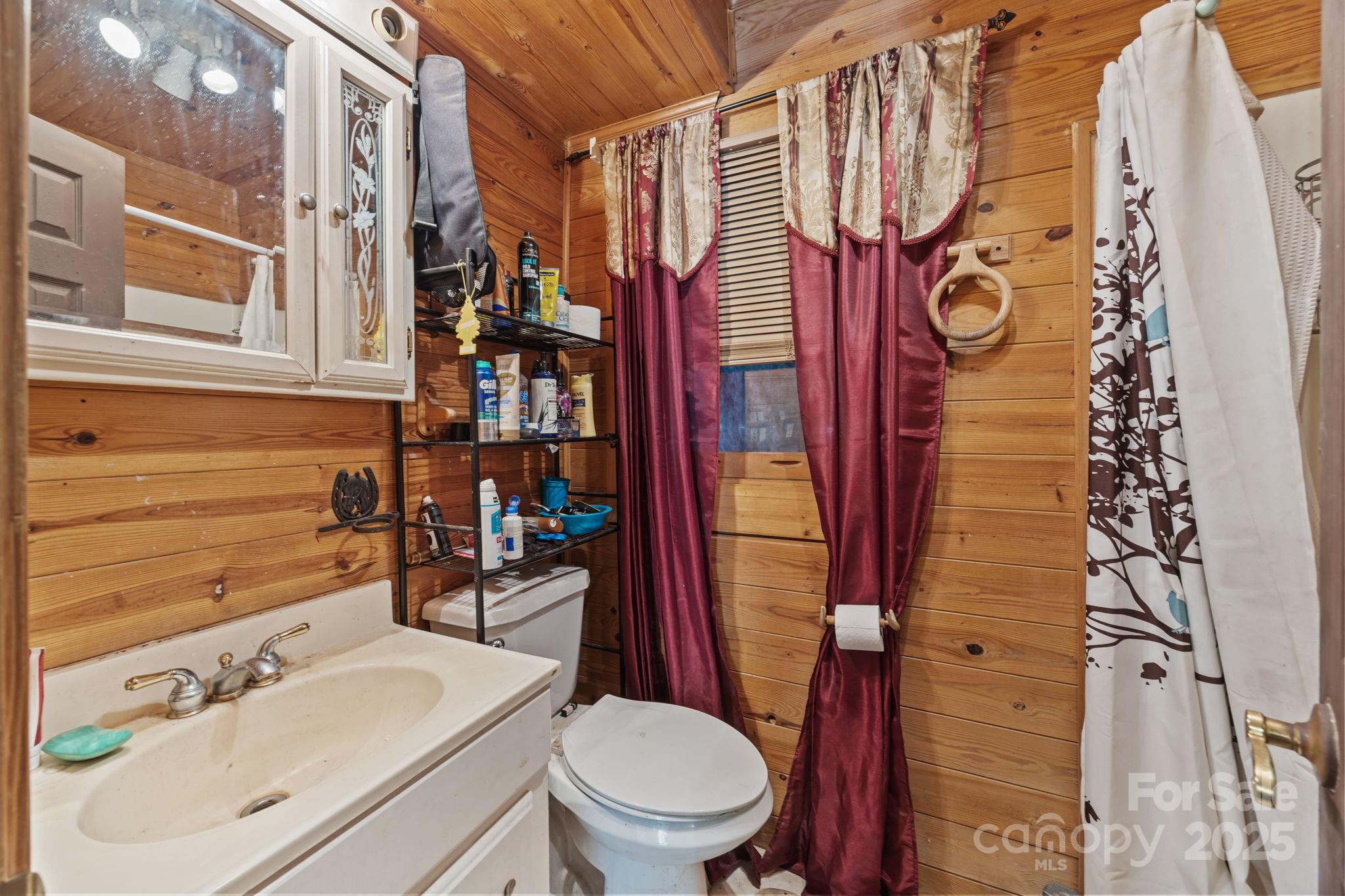 3178 Foxford Road Concord, NC 28025 - Photo 9 of 48 a bathroom with a sink toilet and shower