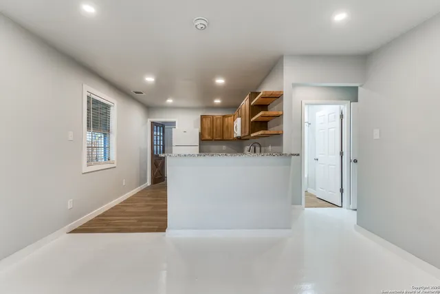 a view of a kitchen with a sink