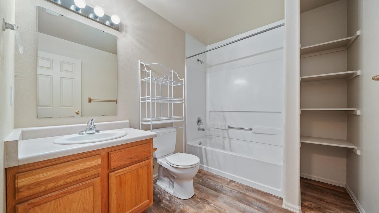 658 Springbrook Drive Grand Junction, CO 81504 - Photo 11 of 27 a bathroom with a sink a toilet and shower