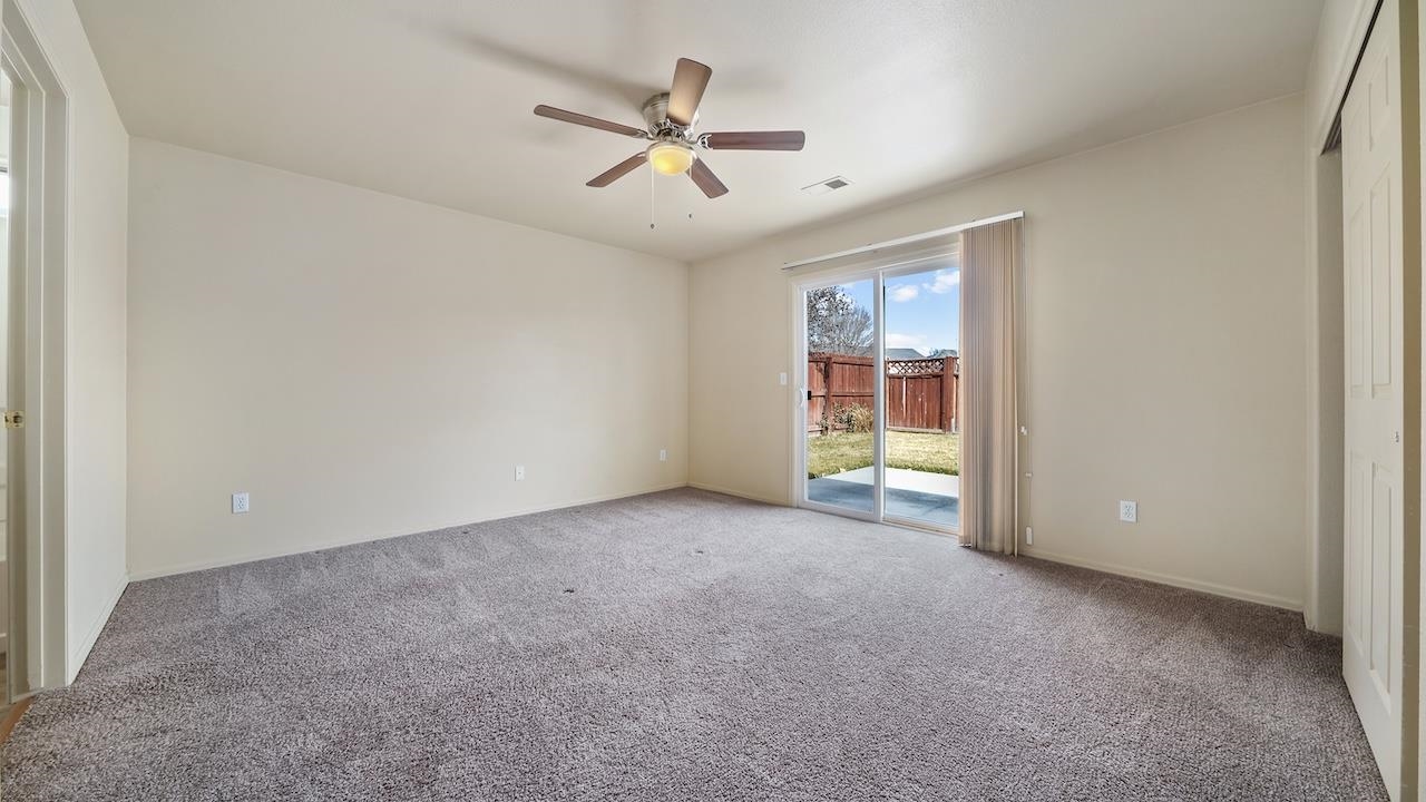 658 Springbrook Drive Grand Junction, CO 81504 - Photo 13 of 27 a view of an empty room with a window