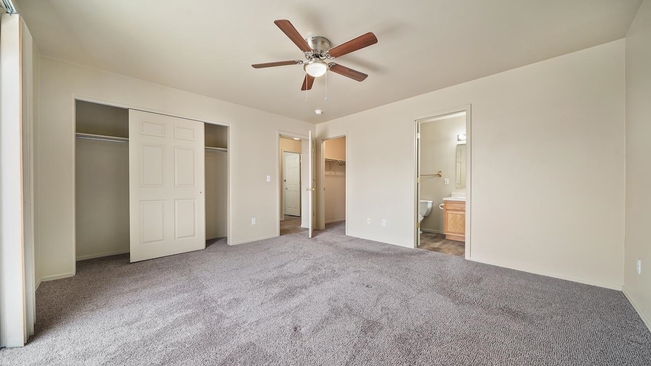 658 Springbrook Drive Grand Junction, CO 81504 - Photo 14 of 27 a view of a livingroom with a ceiling fan