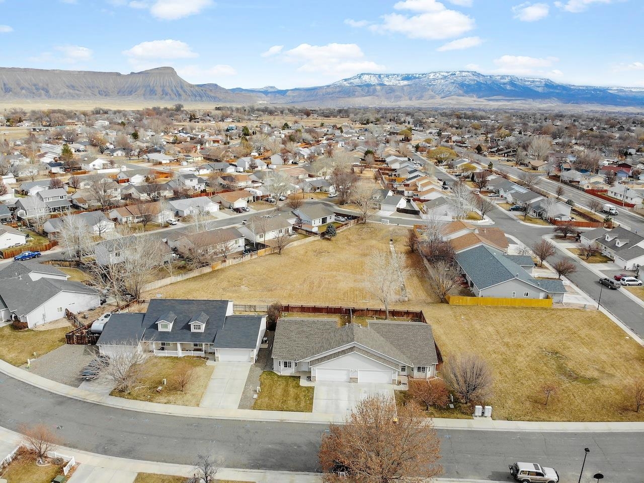658 Springbrook Drive Grand Junction, CO 81504 - Photo 19 of 27 an aerial view of residential houses with outdoor space