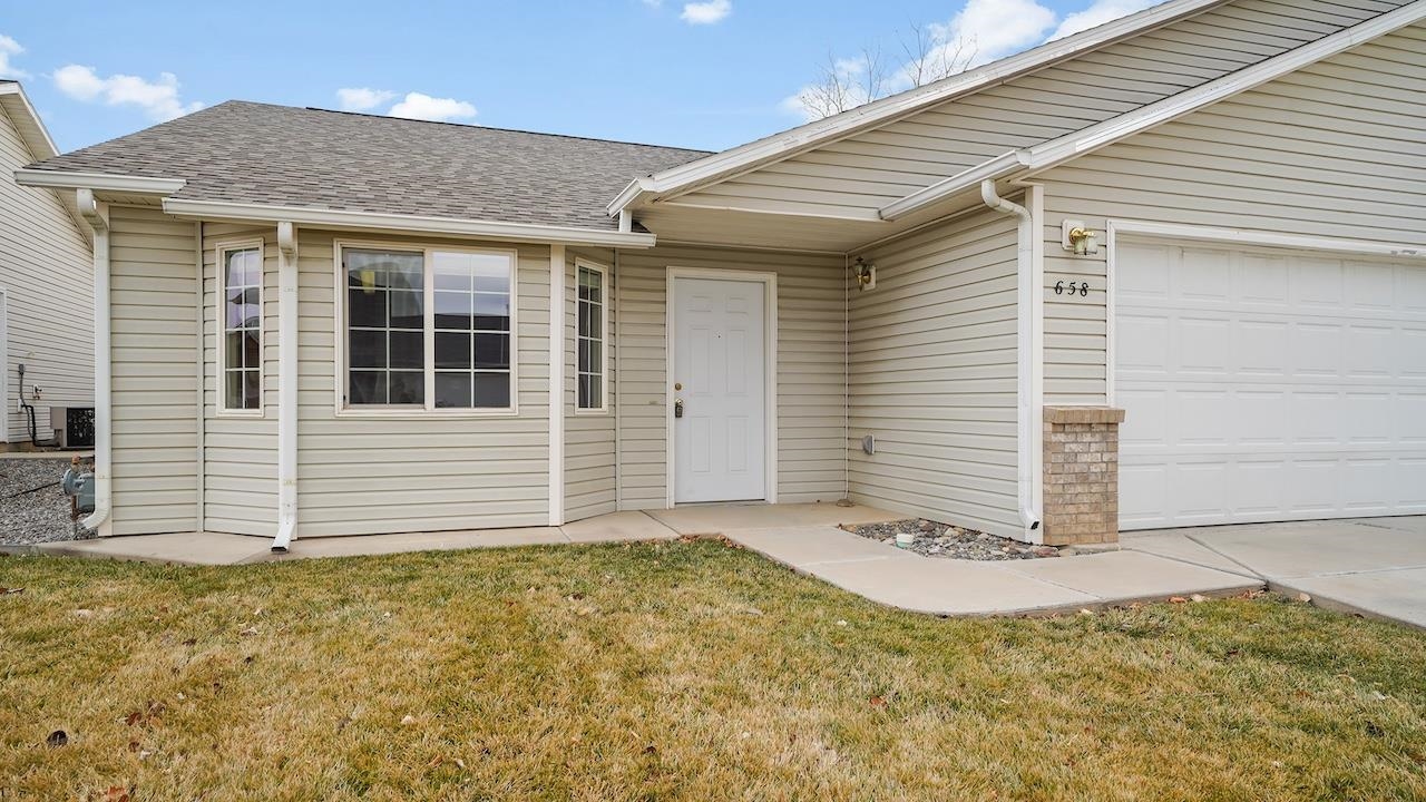 658 Springbrook Drive Grand Junction, CO 81504 - Photo 2 of 27 a view of a house with small yard