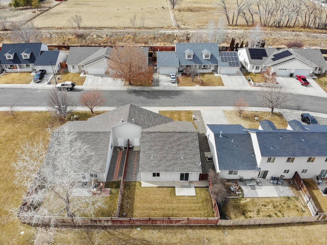 658 Springbrook Drive Grand Junction, CO 81504 - Photo 21 of 27 an aerial view of residential houses with outdoor space