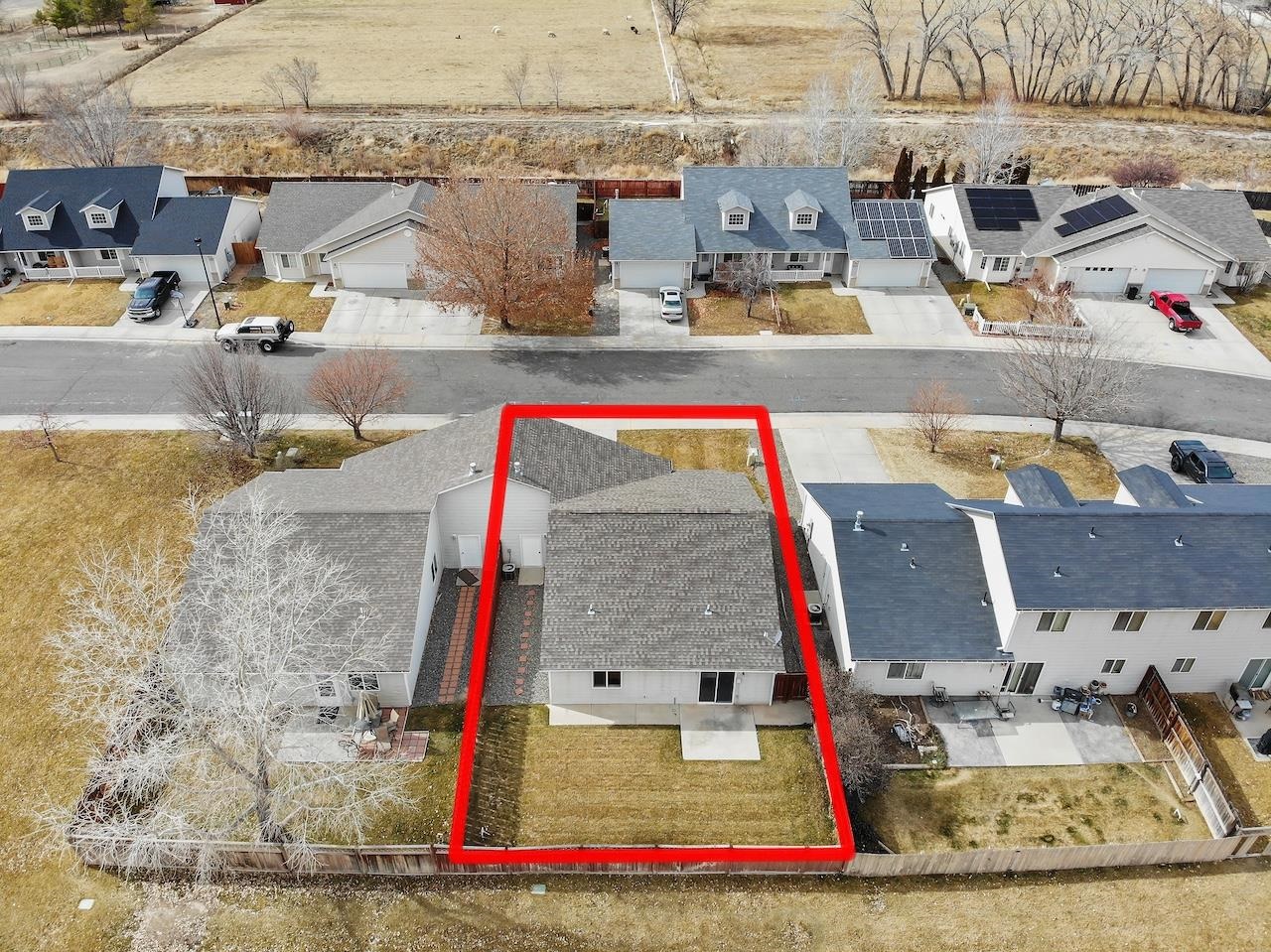 658 Springbrook Drive Grand Junction, CO 81504 - Photo 22 of 27 an aerial view of residential houses with outdoor space