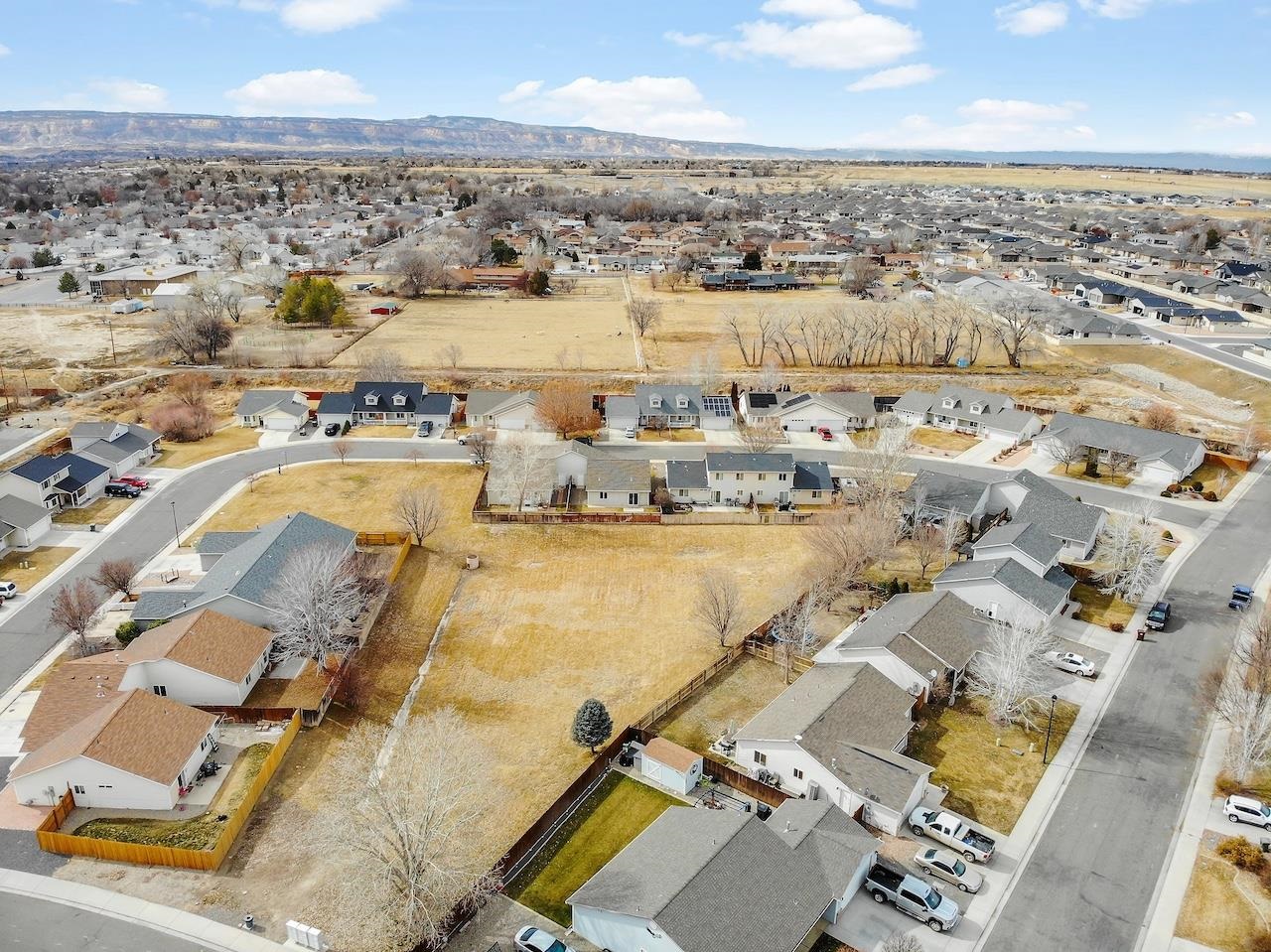 658 Springbrook Drive Grand Junction, CO 81504 - Photo 23 of 27 an aerial view of residential houses with outdoor space