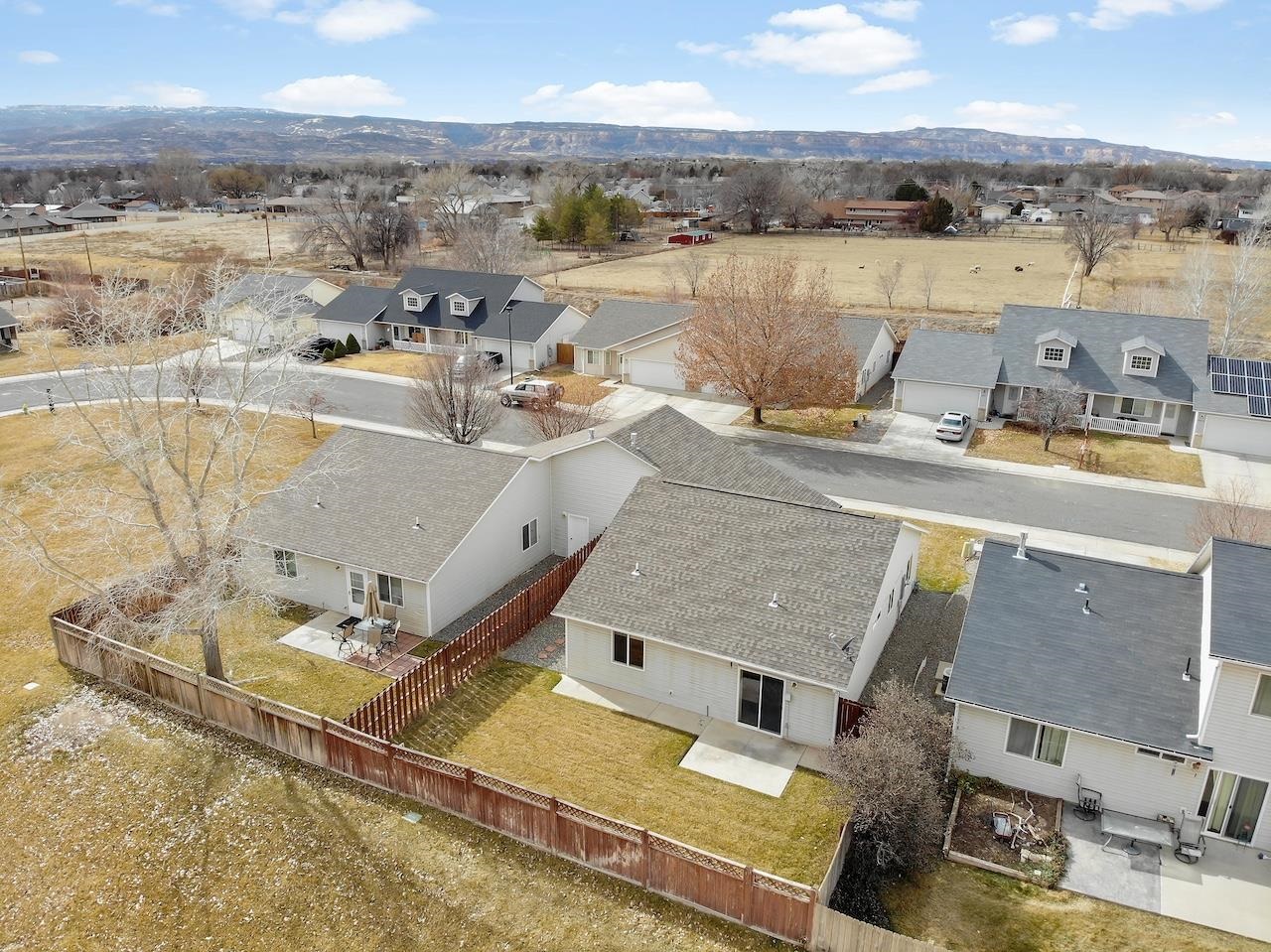 658 Springbrook Drive Grand Junction, CO 81504 - Photo 24 of 27 an aerial view of a house with a lake view