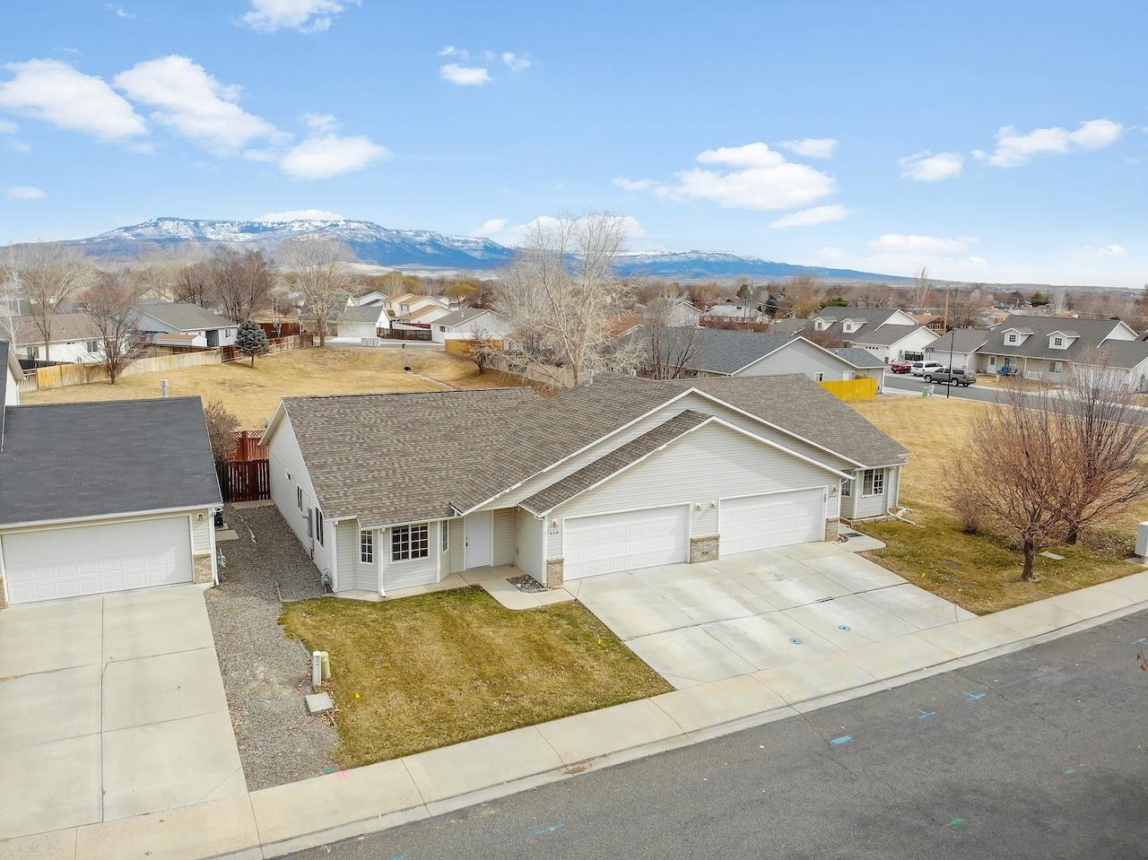 658 Springbrook Drive Grand Junction, CO 81504 - Photo 4 of 27 an aerial view of a house with a yard