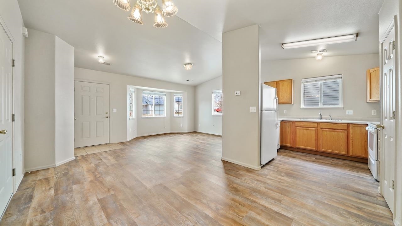 658 Springbrook Drive Grand Junction, CO 81504 - Photo 7 of 27 a view of a kitchen with a sink and a large window