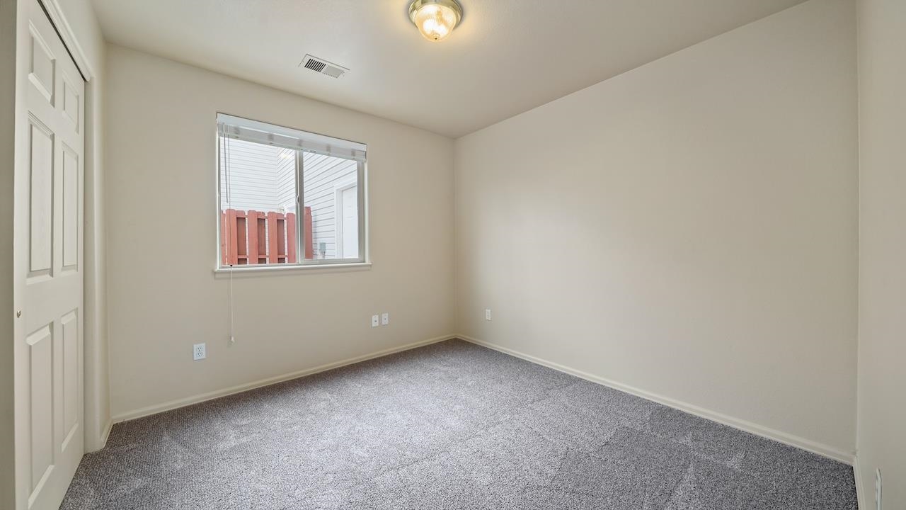 658 Springbrook Drive Grand Junction, CO 81504 - Photo 10 of 27 an empty room with windows