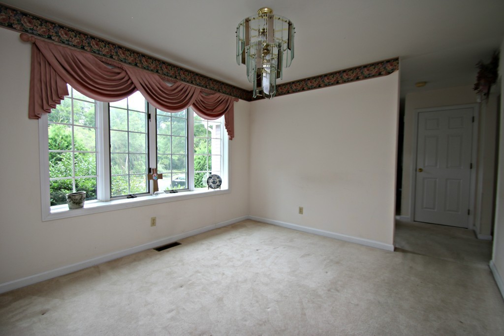 1 Lamplighters Way Saugus, MA 01906 - Photo 11 of 19 a view of an entrance door and a window