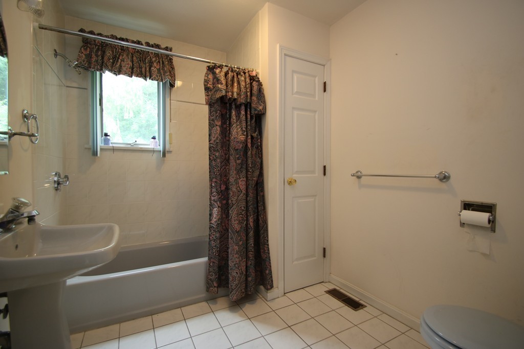 1 Lamplighters Way Saugus, MA 01906 - Photo 15 of 19 a bathroom with a bathtub a shower and a sink