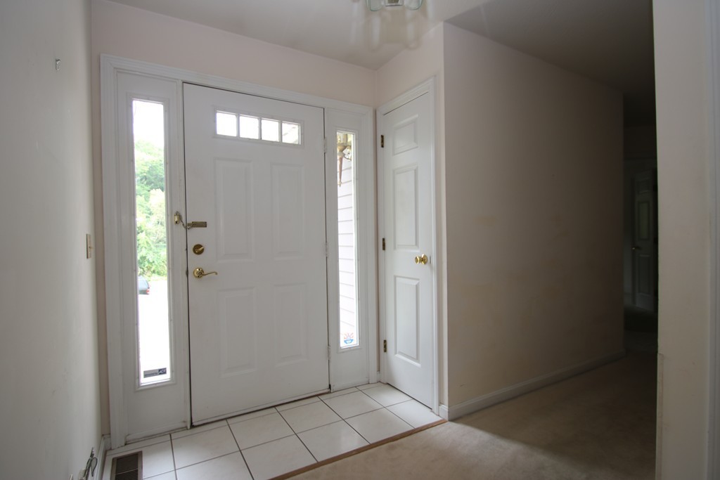 1 Lamplighters Way Saugus, MA 01906 - Photo 3 of 19 a view of an entryway with hallway