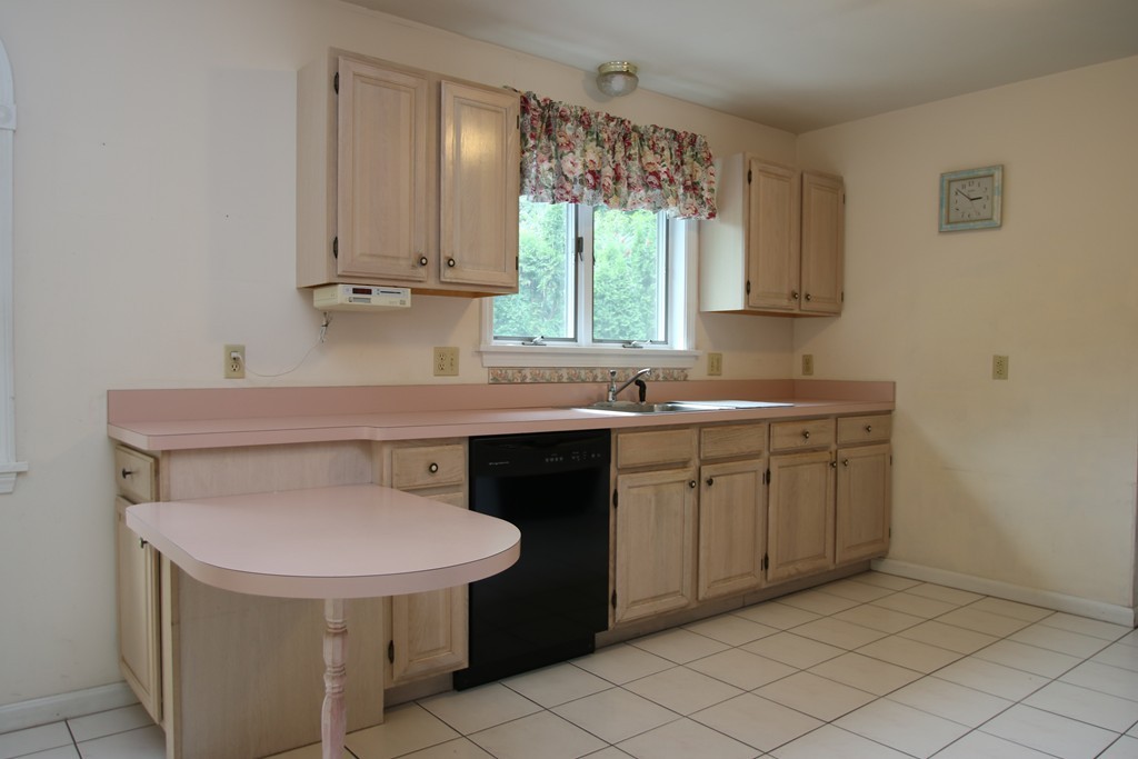 1 Lamplighters Way Saugus, MA 01906 - Photo 5 of 19 a kitchen with a sink cabinets and window