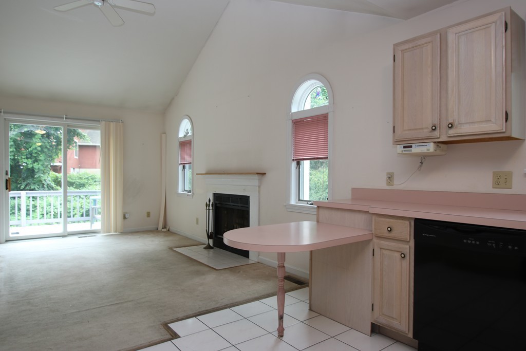 1 Lamplighters Way Saugus, MA 01906 - Photo 8 of 19 a kitchen with a sink cabinets and a wooden floor