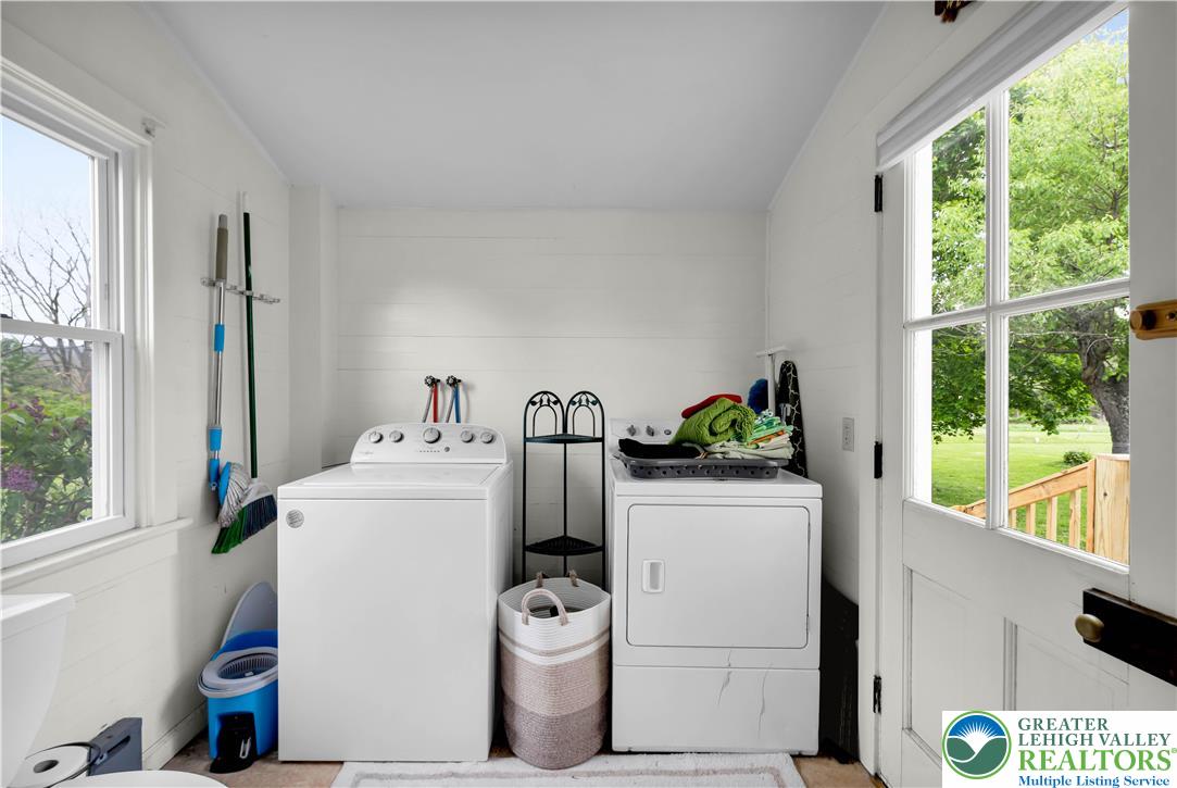 7281 Decatur Street New Tripoli, PA 18066 - Photo 11 of 24 a utility room with sink dryer and washer